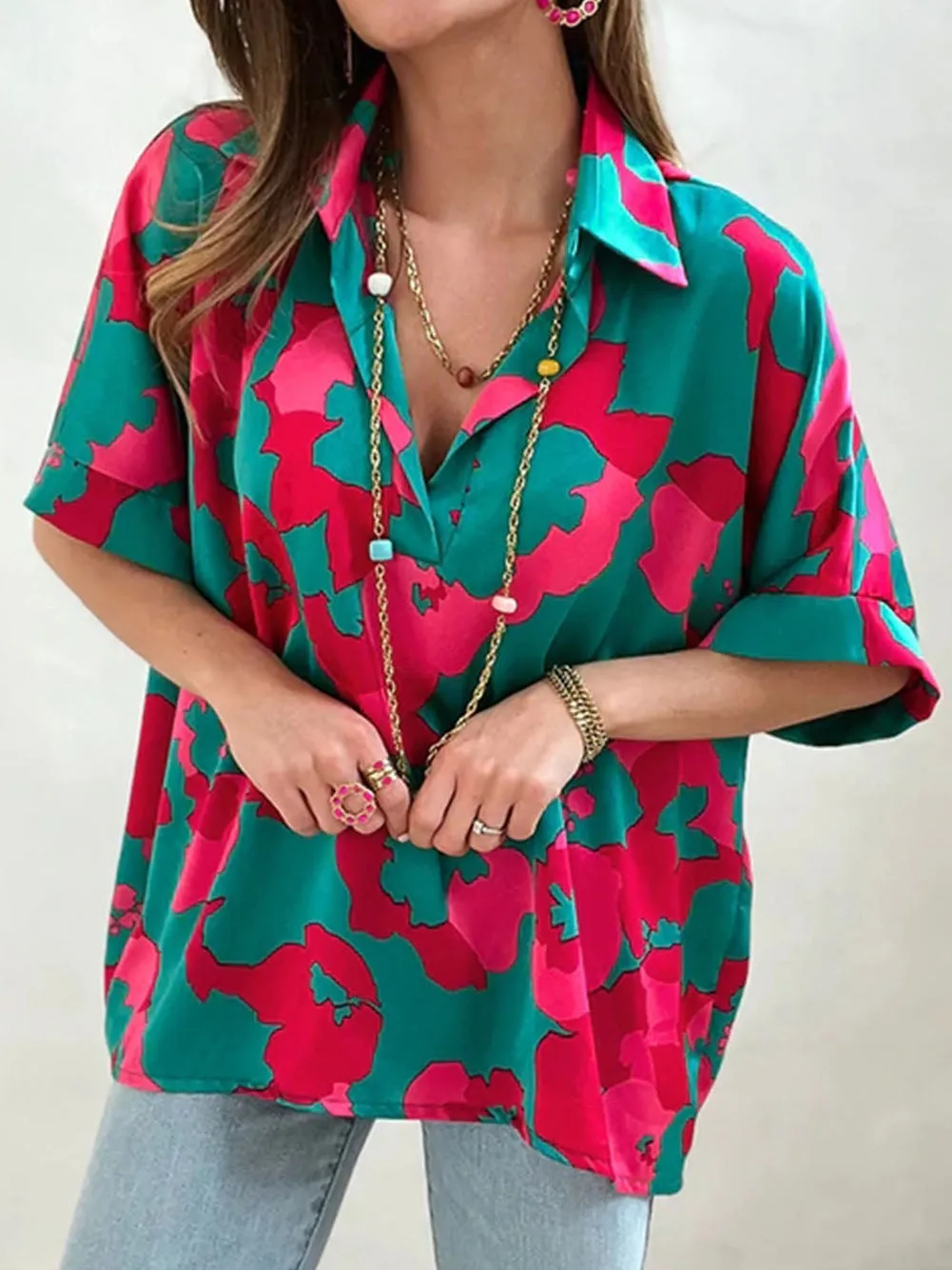 Abstract Green V-Neck Blouse with Geometric Print