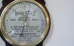 Art Deco Period Carved Oak Aneroid Wheel Barometer with Dial Advertisement for Harry Hall, London