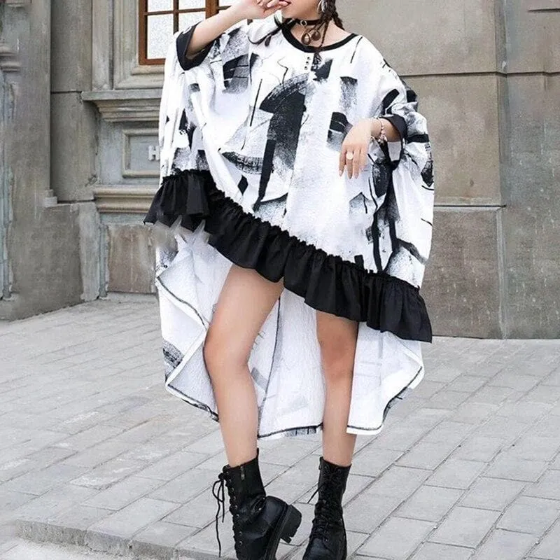 Cape-Like Dress With Ruffled Hem And Abstract Print