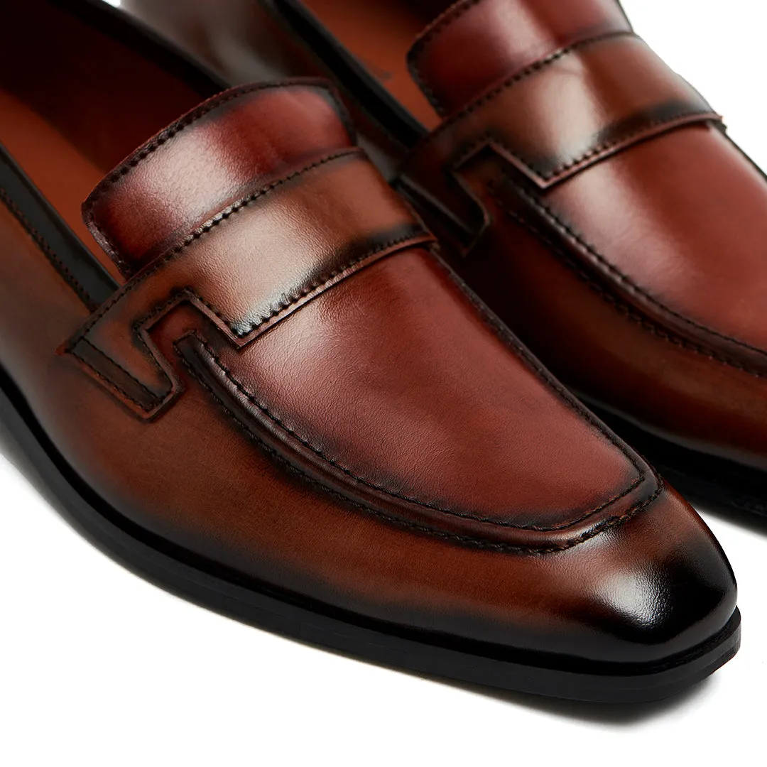 TAN SLIP-ONS WITH APRON STITCH DETAIL